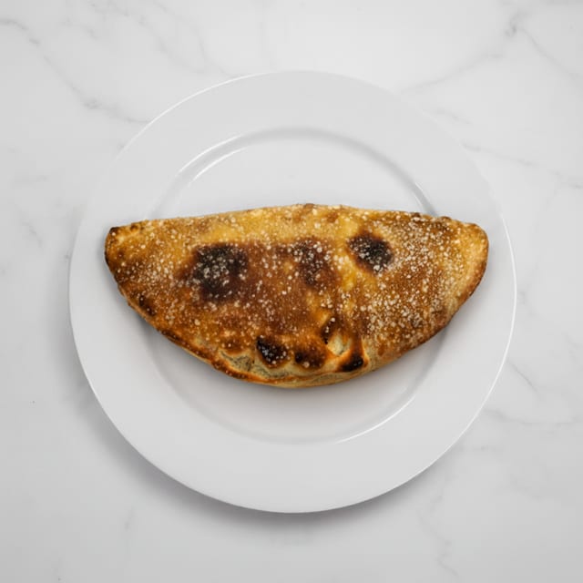 Calzone With Cheese and Sauce.